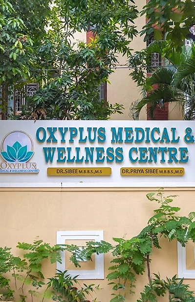Best Medical and Wellness Centre in a Green Location Woman embracing natural beauty with glowing skin promoting personal wellness and skincare focus.